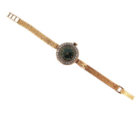 A lady's diamond-set wristwatch, the green enamel dial with gold Arabic numerals and rose-cut diamond bezel. On a 9ct gold ga