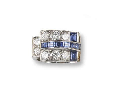 An odeonesque sapphire and diamond ring, C1940, of geometric design and set with baguette-shaped sapphires and circular-cut d