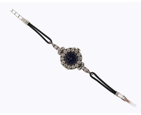 A lady's diamond-set dress wristwatch, the blue enamel dial with silver Arabic numerals, the bezel set with circular-cut diam