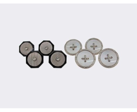 A cased set of four dress studs, each centred with a circular-cut diamonds on guilloche white metal ground and octagonal blac