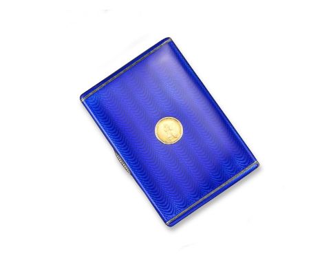 A rectangular silver gilt cigarette case by Carl Faberge, with dark blue guilloche enamel and silver decorated borders. Diamo