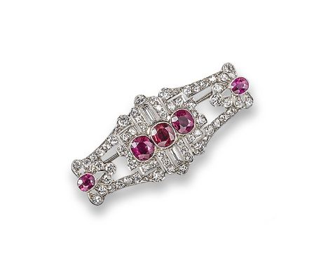 A ruby and diamond-set brooch, the early 20th century brooch is set with five oval shaped rubies within a surround of baguett