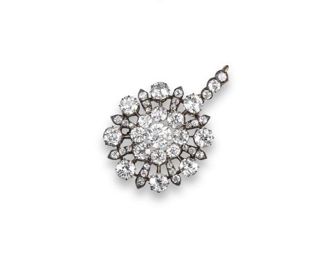 A late Victorian diamond set target pendant, centred with an old brilliant-cut diamond set within a surround of eight smaller