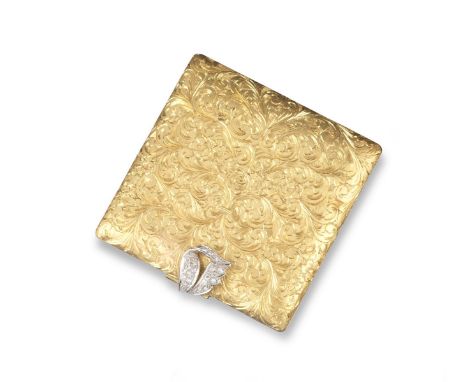 A yellow gold square-shaped compact, with internal powder compartment and mirror. Diamond-set floral clasp and profuse foliat