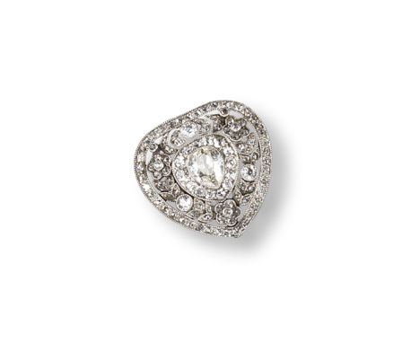 A Belle Epoque diamond set heart-shaped brooch, centred with a pear-shaped diamond and millegrain-set within a surround of ci