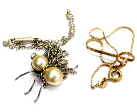 Two items of jewellery, comprising a 9ct gold box link bracelet, 1.3g, and a silver and cultured pearl set spider pendant and