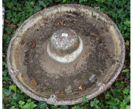 A cast iron agricultural Mexican hat type feeding trough, 86cm diameter.