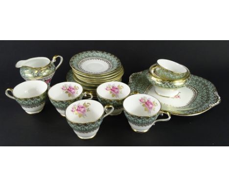 An Aynsley porcelain tea service, decorated with single of a rose picked out in gilt, to include six cups, saucers, side plat