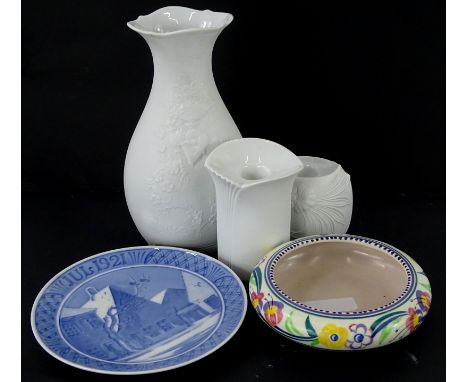 Three items of Kaiser bisque porcelain, to include a baluster shaped vase, a Poole pottery shallow bowl, decorated with flowe