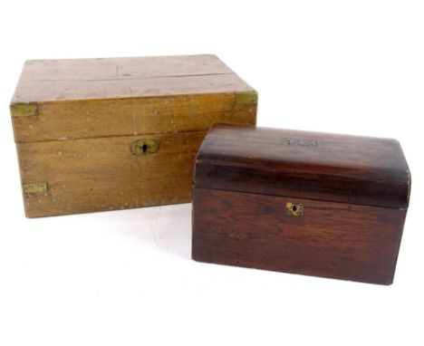 A Victorian rosewood tea caddy, the hinged lid with decorative brass lettering to centre (tea) enclosing tow lidded divisions