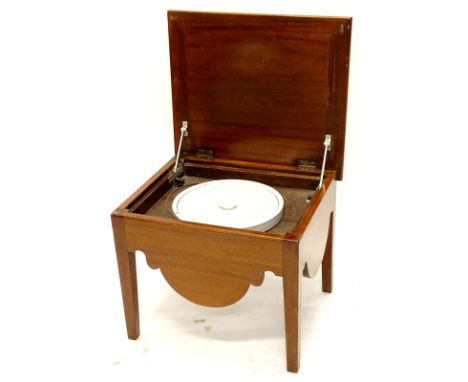 A 19thC mahogany box commode, the hinged lid enclosing a ceramic insert, on square tapering legs, 53cm wide.