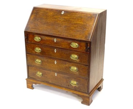 A George III oak and mahogany cross banded bureau, the fall enclosing a fitted interior above four graduated drawers, each wi