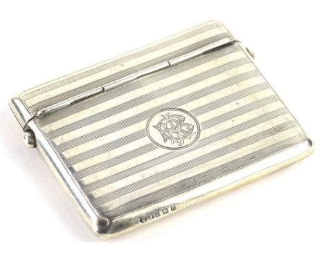 A George V engine turned silver cigarette case, with double hinged lid, Birmingham 1912, 3¾oz. Provenance: The Estate of Miss