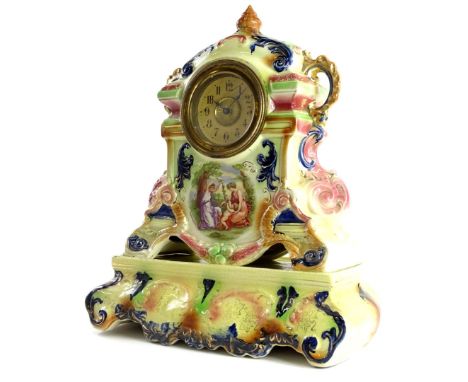 A Staffordshire pottery mantel clock, the paper dial with Roman numerals, the case decorated in Angelica Kauffman style with 