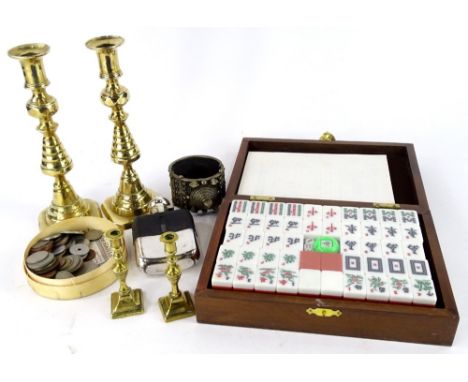 A collection of items, to include foreign coins, a silver plated and leather hip flask, African metal bracelet, brass candles