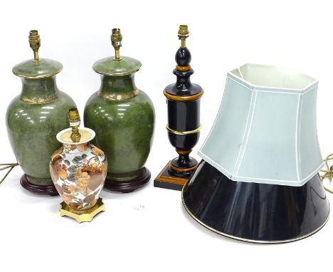 A pair of ceramic green based lamp bases, a composite ebonised and simulated wood lamp base, and oriental lamp base, decorate