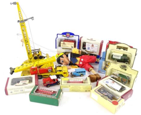 A collection of diecast vehicles, to include Lledo promotional pieces, Days Gone, a Pinocchio puppet, a Siku crane etc.