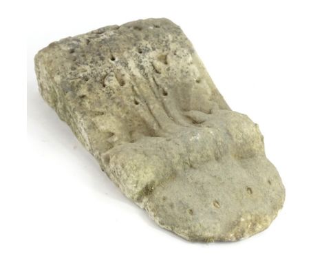 A 19thC carved marble boss or bracket, weathered, 34cm high.