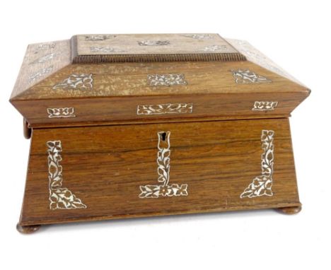 An early Victorian rosewood and mother of pearl inlaid sarcophagus shaped jewellery box, with ring side handles, on bun feet 