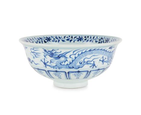 LARGE BLUE AND WHITE 'DRAGON' BOWL QING DYNASTY, 19TH CENTURY  清 青花龍紋大碗 the rounded sides supported on a short splayed foot a