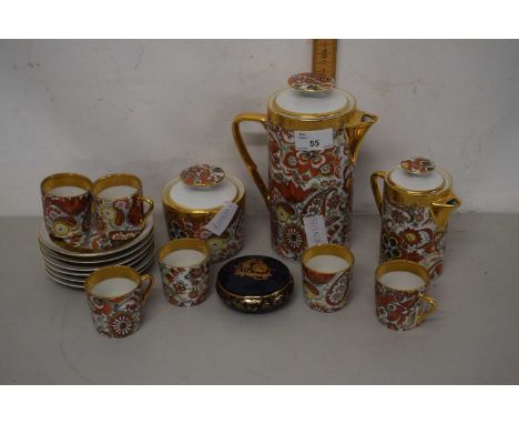 A quantity of Limoges gilt decorated coffee wares and further trinket box