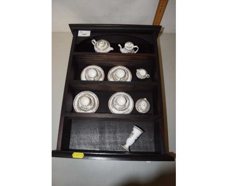 Collection of Wedgwood miniature tea wares and accompanying wall shelf