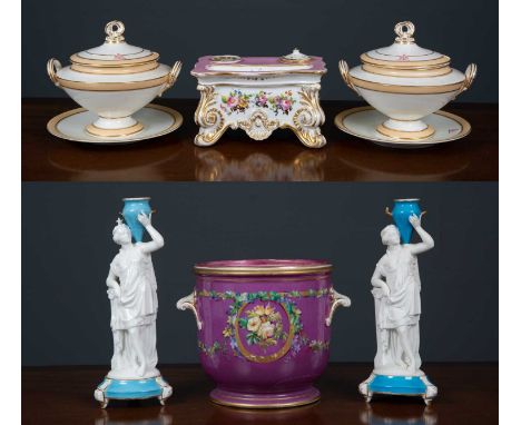 A pair of white and gold sauce tureens on plates, 15cm high together with a pair of candleholders formed as classical women c