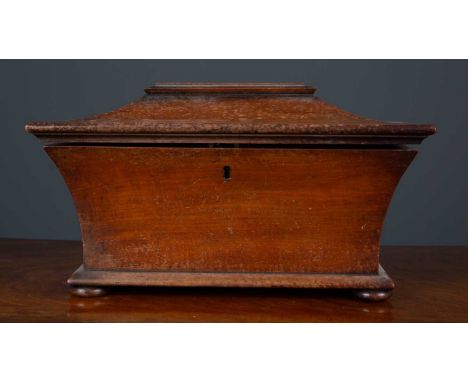 An early Victorian mahogany tea caddy of sarcophagus form, 38.5cm wide x 22cm deep x 22cm highCondition report: Later glass m