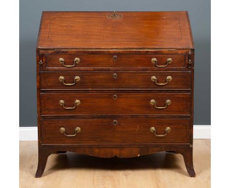 A George III mahogany bureau, the fall front opening to reveal a satinwood interior and a green leather inset top above four 