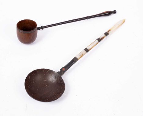 A 19th century sherbet spoon with mother of pearl handle, 25cm in length together with an early 19th century treen handled me