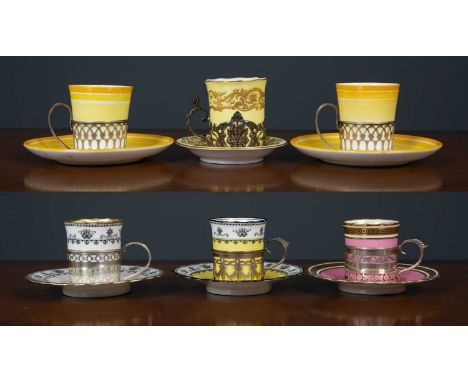 Six early 20th century pierced silver coffee can holders to include a pair of Walker &amp; Hall examples, each with Paragon c