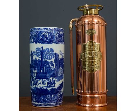 A Regent copper fire extinguisher with brass mounts and labels, 20cm diameter x 58cm high together with a white porcelain umb