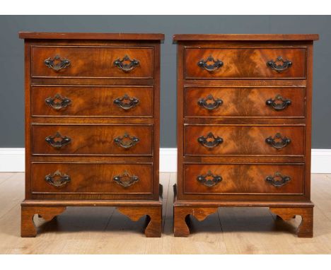 A pair of reproduction mahogany small sized chest of four drawers each raised on bracket feet, each 45cm wide x 32cm deep x 6