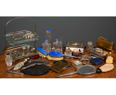 A ladies handbag with silver mounts, a cylindrical small jar with silver lid, a collection of silver mounted dressing table i