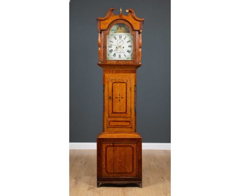 An antique oak longcase clock the painted dial with roman numerals, subsidiary second hand and date aperture, signed 'William