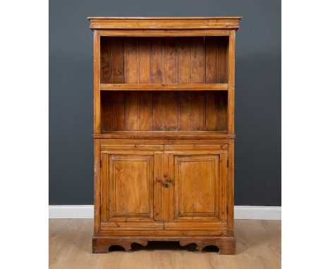 A French provincial elm cupboard with open shelves above twin panelled doors and on bracket feet, 106cm wide x 33.5cm deep x 