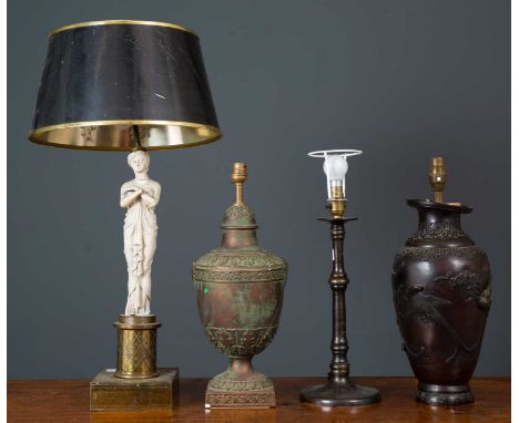 A group of classical style table lamps; two formed as urns, 39cm high excluding fittings; one with base formed as a classical