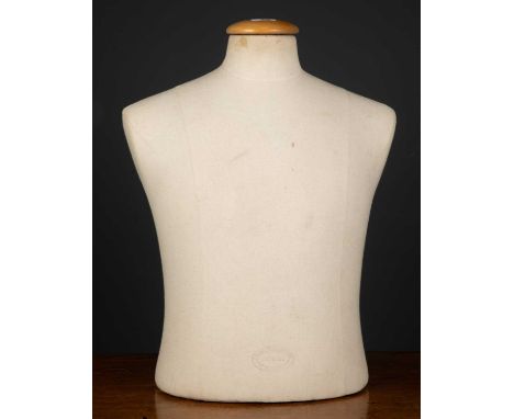 A dressmakers mannequin torso by Couture Paris, stamped indistinctly to the front, 44cm wide at the shoulder x 57cm highCondi