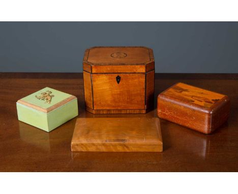 A George III satinwood octagonal tea caddy with a parquetry inlaid star motif, 17cm wide x 13cm deep x 13cm high together wit