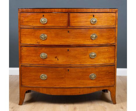 A George III mahogany bowfronted chest with two short and three long drawers on splayed bracket feet, 105.5 cm wide x 52cm de