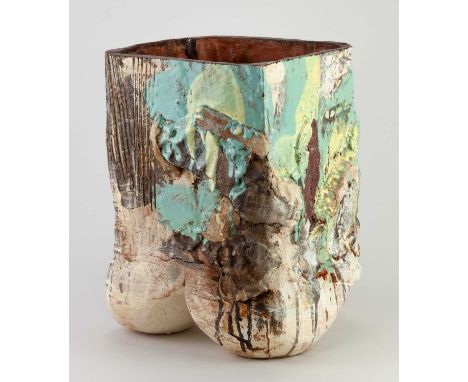 † SIMON CARROLL (1964-2009); a large square earthenware pot on splayed tripod feet with incised decoration covered in coloure