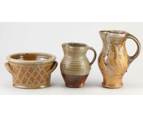 † JEREMY STEWARD (born 1972); a wood fired soda glazed stoneware jug partially covered in running green ash glaze, height 21c