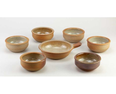 Winchcombe Pottery; a set of six small bowls, impressed pottery marks, diameter 10.5cm, and a skillet, diameter 18.5cm (inclu