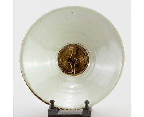† BERNARD LEACH (1887-1979) for Leach Pottery; a porcelain flared dish with banded iron decoration to exterior and a flying b