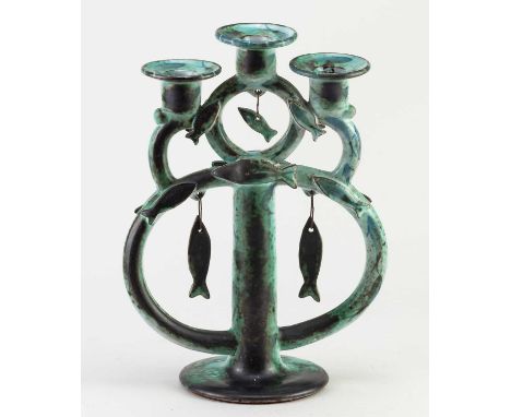 Laurieston House Pottery; a tin glazed earthenware candelabra decorated with fish, designed by Jason Shackleton and decorated