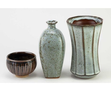 † JOHN LEACH (1939-2021) for Muchelney Pottery; a cut sided stoneware vase covered in mottled grey and kaki glaze, impressed 