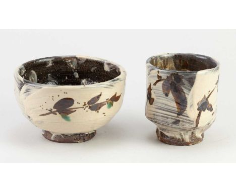 † JIM MALONE (born 1946); a stoneware chawan covered in brushed slip with iron decoration and copper green spots, impressed J