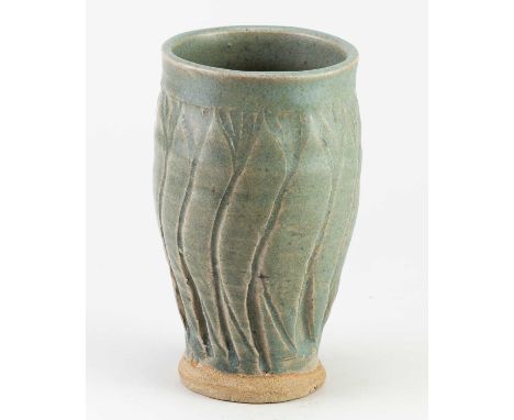 † KATHARINE PLEYDELL-BOUVERIE (1895-1985); a stoneware vase covered in turquoise/green ash glaze with incised leaf decoration