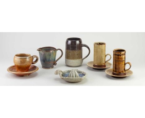 A group of studio ceramics including a cup and saucer by Jeremy Steward, a lemon squeezer by Mike Goddard, a jug by Mary Chap