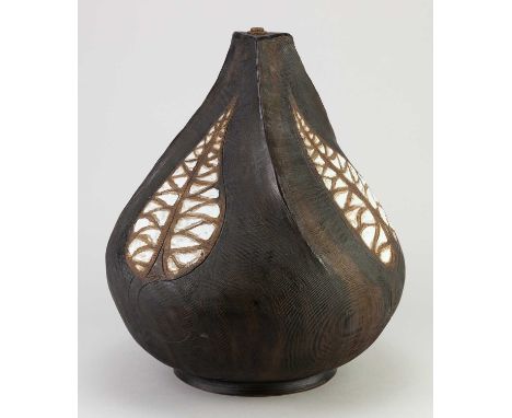 † MURIEL WRIGHT (1914-2003); a stoneware lamp base with textured surface covered in iron glaze and incised leaf decoration, p